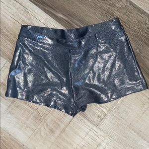 Capezio child dance/gymnastics shorts. M silver